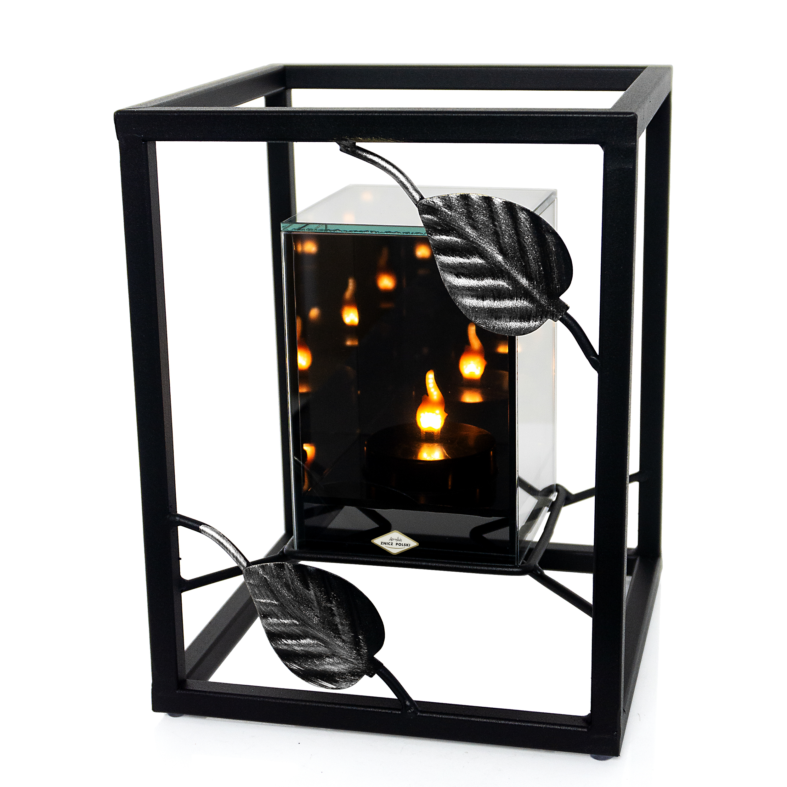 Metalowy znicz w formie sześcianu z ozdobnymi liśmi i LED infinity